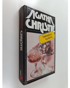Kirjailijan Agatha Christie käytetty kirja Helmeilevä kuolema