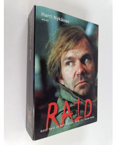 Kirjailijan Harri Nykänen käytetty kirja Raid ; Raid ja paperiansa ; Raid ja lihava mies