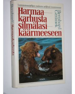 Kirjailijan Bernhard Grzimek käytetty kirja Harmaakarhusta silmälasikäärmeeseen : luonnonsuojelijan mukana neljässä maanosassa