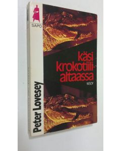 Kirjailijan Peter Lovesey käytetty kirja Käsi krokotiilialtaassa