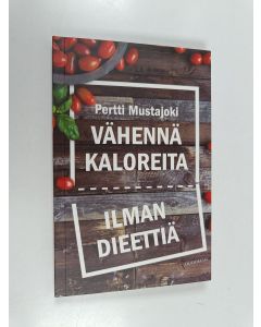 Kirjailijan Pertti Mustajoki käytetty kirja Vähennä kaloreita ilman dieettiä