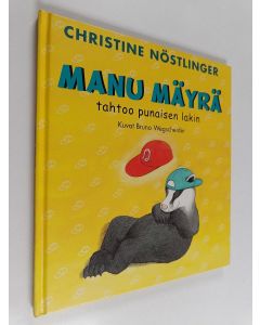 Kirjailijan Christine Nöstlinger käytetty kirja Manu Mäyrä tahtoo punaisen lakin