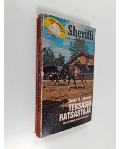 Kirjailijan Ray Hogan käytetty kirja Teksasin ratsastaja