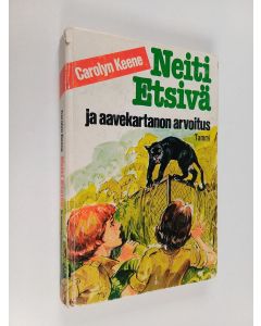 Kirjailijan Carolyn Keene käytetty kirja Neiti Etsivä ja aavekartanon arvoitus