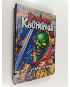 Kirjailijan R. L. Stine käytetty kirja Noidutun naamion nauru