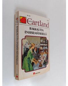 Kirjailijan Barbara Cartland käytetty kirja Rakkautta ensisilmäyksellä