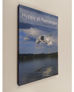 Kirjailijan Juhani Manninen käytetty kirja Hyppy yli Paarlahden