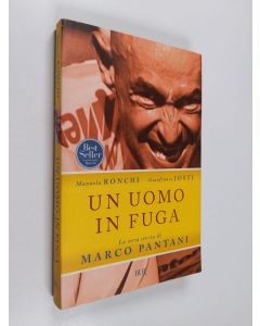 Kirjailijan Gianfranco Josti & Manuela Ronchi käytetty kirja Un uomo in fuga : La vera storia di Marco Pantani