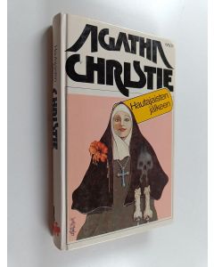 Kirjailijan Agatha Christie käytetty kirja Hautajaisten jälkeen