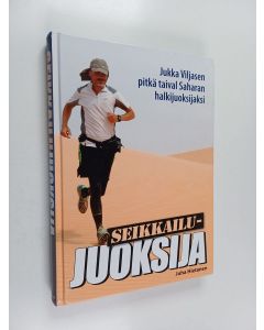 Kirjailijan Juha Hietanen käytetty kirja Seikkailujuoksija : Jukka Viljasen pitkä taival Saharan halkijuoksijaksi
