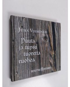 Kirjailijan Juha Vuorinen käytetty kirja Puuta ja tupsu tuoretta ruohoa