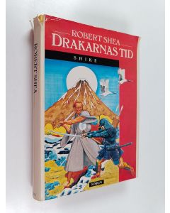 Kirjailijan Robert Shea käytetty kirja Shike : Drakarnas tid