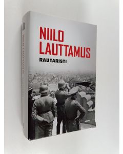 Kirjailijan Niilo Lauttamus käytetty kirja Rautaristi
