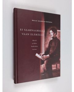 Kirjailijan Maija Salonius-Hatakka käytetty kirja Ei saarnaamalla vaan elämällä : Akseli ja Eelo Isohiiden tarina