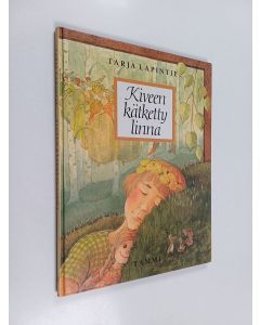 Kirjailijan Tarja Lapintie käytetty kirja Kiveen kätketty linna