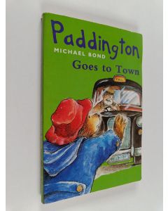 Kirjailijan Michael Bond käytetty kirja Paddington goes to town