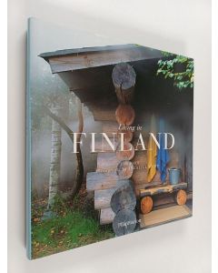 Kirjailijan Tim Bird käytetty kirja Living in Finland