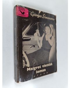 Kirjailijan Georges Simenon käytetty kirja Maigret viettää lomaa