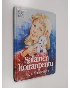 Kirjailijan Tuula Kallioniemi käytetty kirja Salainen koiranpentu : lastenromaani