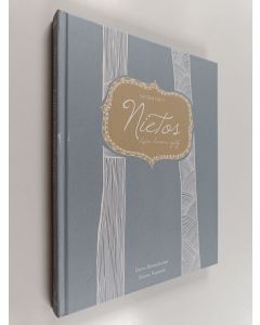 Kirjailijan Veera Komulainen käytetty kirja Nietos : Lapin kansan synty