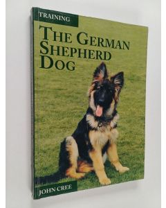 Kirjailijan John Cree käytetty kirja Training the German Shepherd Dog