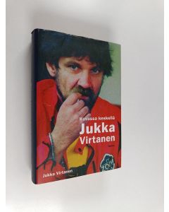 Kirjailijan Jukka Virtanen käytetty kirja Kuvassa keskellä Jukka Virtanen