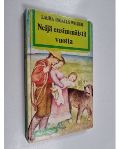 Kirjailijan Laura Ingalls Wilder käytetty kirja Neljä ensimmäistä vuotta