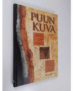 Kirjailijan Juha Vartiainen käytetty kirja Puun kuva