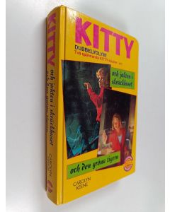 Kirjailijan Carolyn Keene käytetty kirja Kitty och jakten i skräckhuset ; Kitty och den gröna tigern