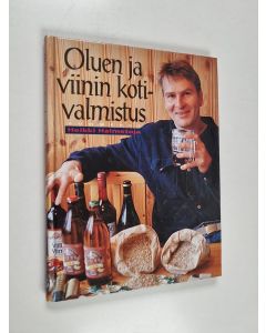 Kirjailijan Heikki Halmetoja käytetty kirja Oluen ja viinin kotivalmistus