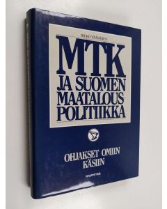 Kirjailijan Jouko Väänänen käytetty kirja MTK ja Suomen maatalouspolitiikka : Ohjakset omiin käsiin