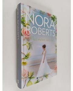 Kirjailijan Nora Roberts käytetty kirja Mies meren äärellä