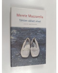 Kirjailijan Merete Mazzarella käytetty kirja Tähtien väliset viivat : esseitä identiteetistä