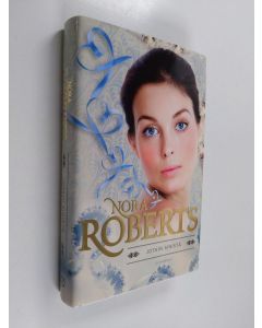 Kirjailijan Nora Roberts käytetty kirja Jotain sinistä