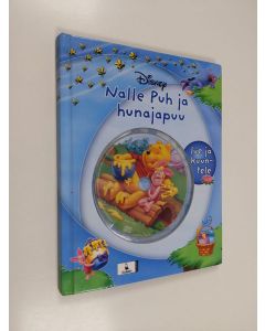 Kirjailijan Janet Cambell käytetty kirja Nalle Puh ja hunajapuu