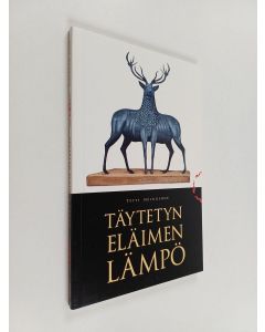 Kirjailijan Tytti Heikkinen käytetty kirja Täytetyn eläimen lämpö