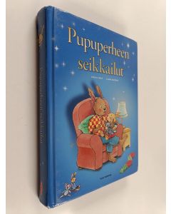 Kirjailijan Nina Flores käytetty kirja Pupuperheen seikkailut