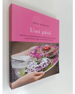 Kirjailijan Heidi Kuusisto käytetty kirja Uusi päivä : matka kokonaisvaltaiseen muutokseen luonnollisen ravinnon avulla