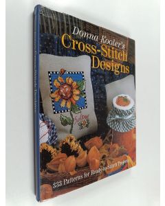 Kirjailijan Donna Kooler käytetty kirja Donna Kooler's cross-stitch desings : 333 patterns for ready-to-stich projects