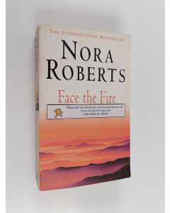Kirjailijan Nora Roberts käytetty kirja Face the fire