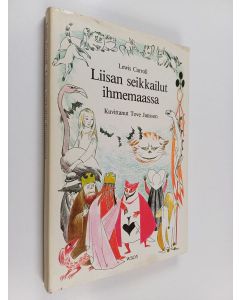 Kirjailijan Lewis Carroll käytetty kirja Liisan seikkailut ihmemaassa (Tove Janssonin kuvittama)