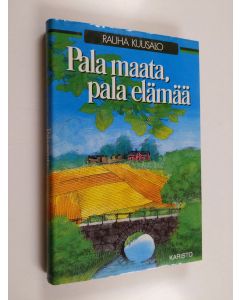 Kirjailijan Rauha Kuusalo käytetty kirja Pala maata, pala elämää