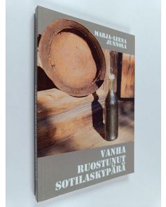 Kirjailijan Marja-Leena Junnola käytetty kirja Vanha ruostunut sotilaskypärä