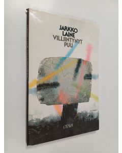 Kirjailijan Jarkko Laine käytetty kirja Villiintynyt puu : runoja