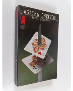 Kirjailijan Agatha Christie käytetty kirja Kortit pöydällä