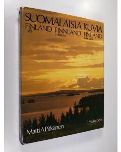 Kirjailijan Matti A. Pitkänen käytetty kirja Suomalaisia kuvia = Finland i bild = Finnland in Bildern = Finland in pictures
