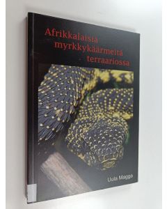 Kirjailijan Uula Magga käytetty kirja Afrikkalaisia myrkkykäärmeitä terraariossa