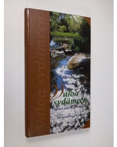 Tekijän Leena Haavisto  käytetty kirja Valoa sydämeen vuoden jokaiselle päivälle