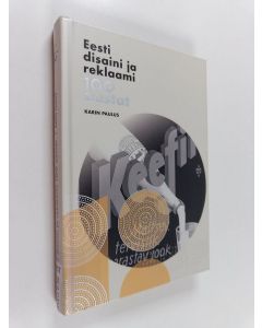 Kirjailijan Karin Paulus käytetty kirja Eesti disaini ja reklaami 100 aastat
