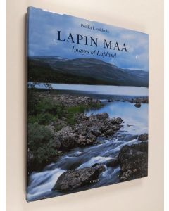 Kirjailijan Pekka Luukkola käytetty kirja Lapin maa = Images of Lapland